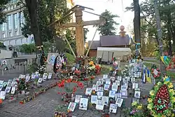 Memorial cross and lamps for the fallen of Euromaidan
