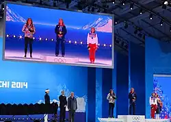 Yarnold on the podium with her gold medal at the 2014 Winter Olympics