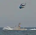 Akkerman during sea trials alongside a Ukrainian Naval Aviation Mi-14.