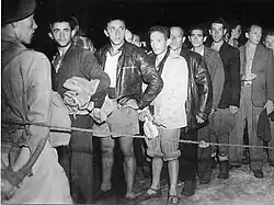 Illegal immigrants being detained from Af Al Pi Chen