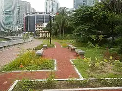 Poblacion Park with Rockwell Center in the background