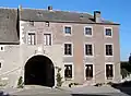 Typical old farm in Héron (17th century).