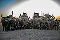 U.S. soldiers of the 181st Infantry Regiment with Asayish members.