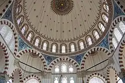 The small Rüstem Pasha Mosque (1561) is an early example of Sinan's use of an octagonal support system.[104]