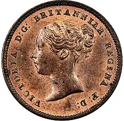Copper coin with a woman's head facing left