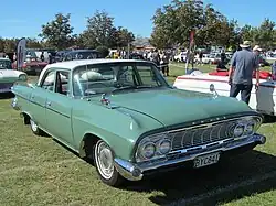 1961 Dodge Dart Pioneer 4-door sedan. This example is in New Zealand and features right-hand drive.
