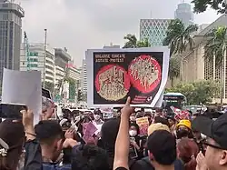 Indonesian Student Protesters showing poster