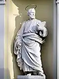 The statue of Saint Peter on the exterior.