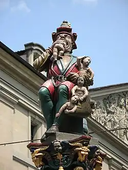 Ogre Fountain (lit. "Child Eater Fountain") at Corn House Square, Bern, Switzerland