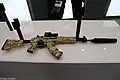 The AK-15 (GRAU 6P71) equipped with a Russian holographic sight and a sound suppressor