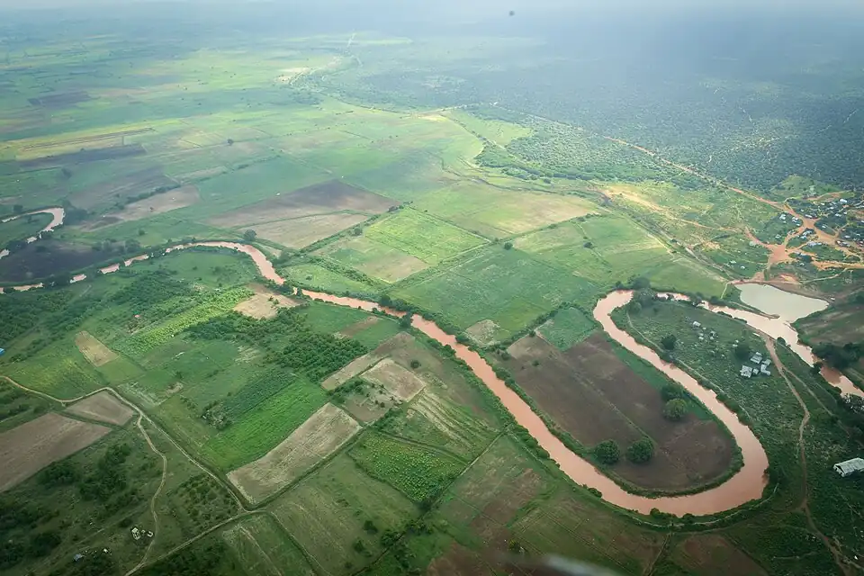 An aerial view of the River Shabelle, Somalia and surrounding farmlands in Hirshabelle State, in a photo taken on 27 November 2022. ATMIS Photo / Raymond Baguma