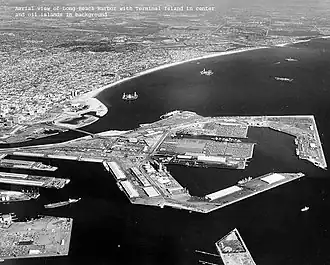 Piers F and J and the THUMS Islands, circa 1967-1971. The RMS Queen Mary is shown moored.