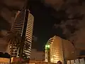 The mosque at night, with surrounding government buildings