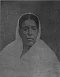 Anandamoyee Debi, mother of Deshapran B. N. Sasmal. She was born to Babu Panchanan Malla of Durgapur near Contai in 1851. She lost her mother at an early age, and was therefore raised by her father.