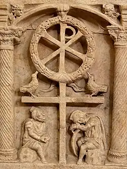 The Chi-Rho with a wreath symbolizing the victory of the Resurrection, above Roman soldiers, c. 350.