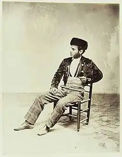 Andalusian, in "Majo" dress, wearing a sombrero calañes