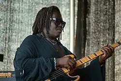Dave Okumu playing bass guitar with Anthony Joseph at the INNtöne Jazzfestival in 2025
