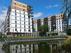 The apartment buildings at Rakowska Street, in front of the Faience Clay Pits.
