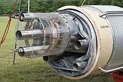 An arc dipole magnet. Electrical bus slots (top and bottom) and beam tube (middle) at the top section of the vacuum shell[20]