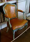 Arm chair, (one of a set), c. 1771, wood, yellow Morocco leather – Harewood House
