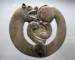 Curled-up feline animal from Arzhan-1, circa 800 BC.[192]