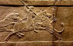 Ashurbanipal on horseback spearing a lion. Alabaster bas-relief from Nineveh, 645–635 BCE.