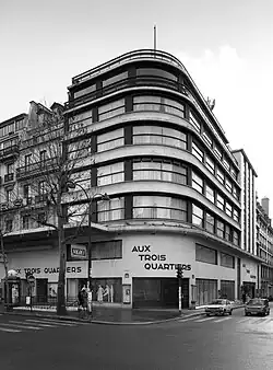 Expressionist architecture influences – Aux Trois-Quartiers department store in Paris, by Louis Faure-Dujarric (1932)[71]