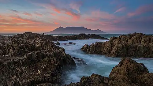 As seen from the other side of Table Bay at sunset