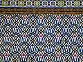 Zellij with darj-wa-ktaf motifs in the upper facade of the gates