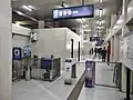 The entrance gate, with the turnstiles wrapped with the 43rd ASEAN Summit of 2023 livery