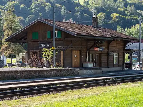 Two-story building with gabled roof