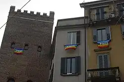 "Pace da tutti i balconi": peace flags hanging from windows in Milan, Italy, in March 2003. Over 1,000,000 were hung against the Iraq war.