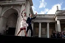 Michelle and Barack Obama in front of the College Green entrance