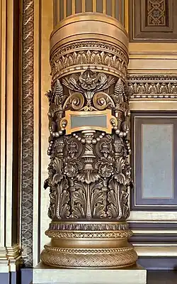 Beaux Arts acanthuses on the base of a column in the Grand Foyer of the Palais Garnier, Paris, designed by Charles Garnier, 1860–1875[15]