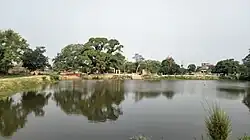 View of the temple from the east bank of the Chaudhary Pokhair