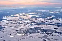 Aerial view with Beausejour in the centre foreground, 2012