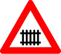 A41: Railroad crossing ahead with gates or barriers