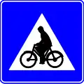 F50: Cyclist and moped crossing