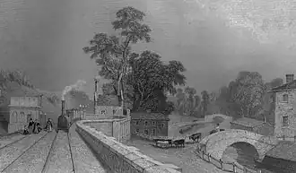 Berkhamsted railway station in 1838 with the Grand Junction Canal to the right[15]