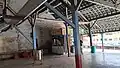 Food stall and waiting area, with roofs supported by wooden beams