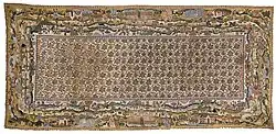 The Bradford carpet, completed in the early 17th century, is a famous example of large canvas work. It is currently housed at the Victoria and Albert Museum.