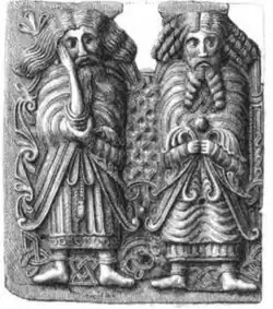 Male figures on the middle right (plaque 5)