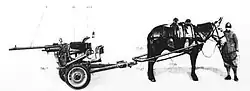Breda 20/65 on wheeled mount drawn by a mule