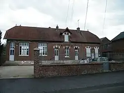 The town hall and school in Breuil