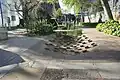 The brick swale feature which slows water flow and captures any rubbish