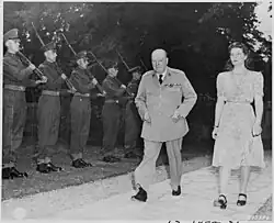 British Prime Minister Winston Churchill and his daughter, Mary, walk in the garden of their residence during the... - NARA - 198961