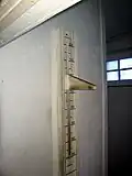 The shot was fired during the measurement of a victim's height. For that purpose, a hole was made through the measuring device.