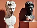 Busts of Juba II in a temporary exhibit at the National Archaeological Museum of Spain. The marble bust on the right dates to around 10 AD, while bronze bust on the right dates to circa 25 BC.