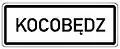 Kocobędz – ę on a road sign in Czechia in Polish