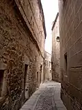 Calle Olmos, a typical narrow street in the Monumental City